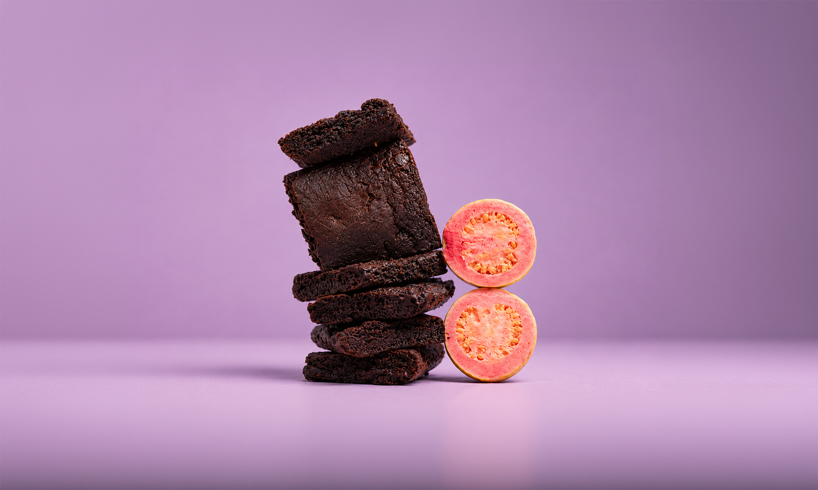 Stacked brownies with pink citrus fruit