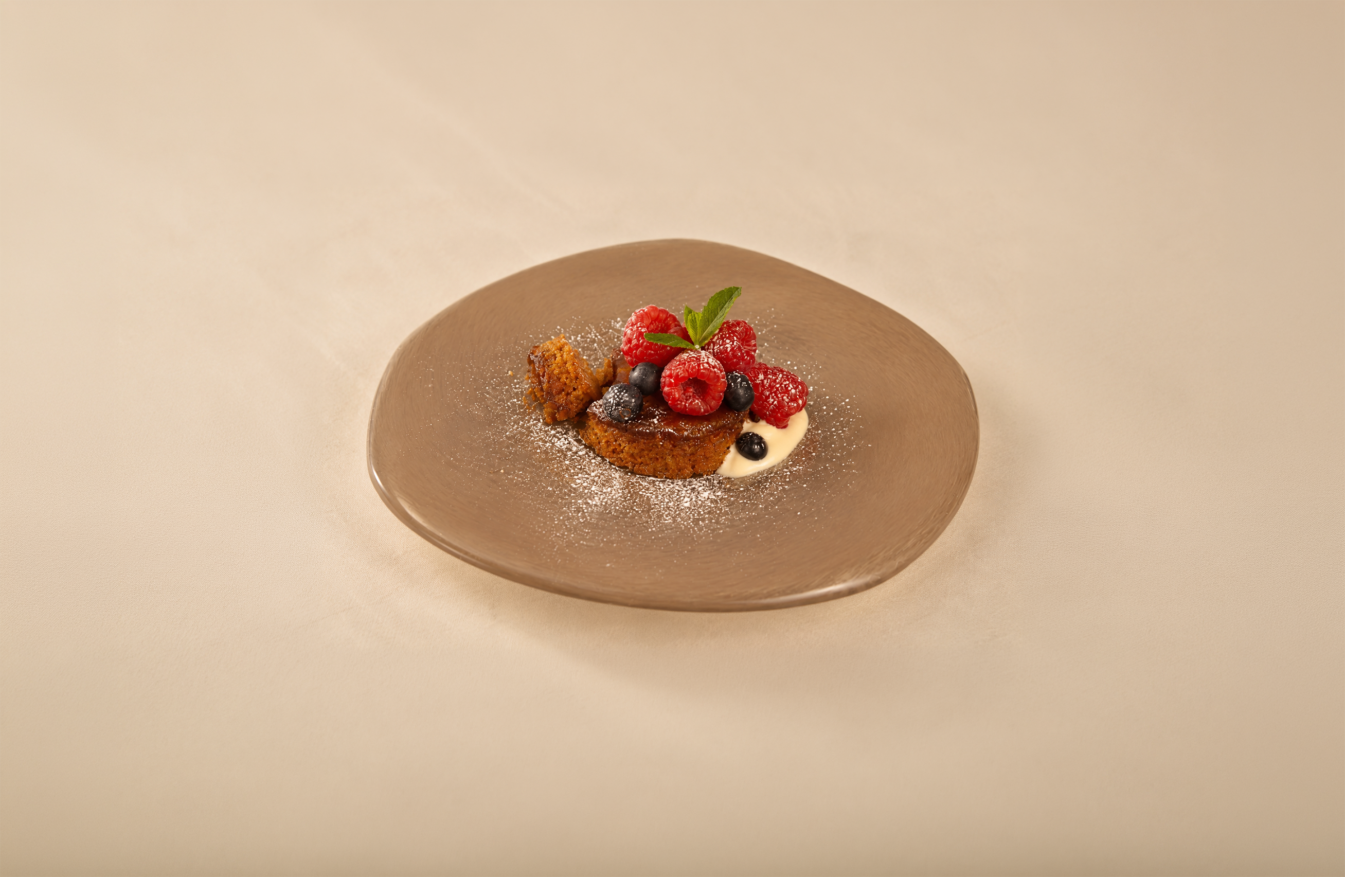 BAK caramel pudding served with berries