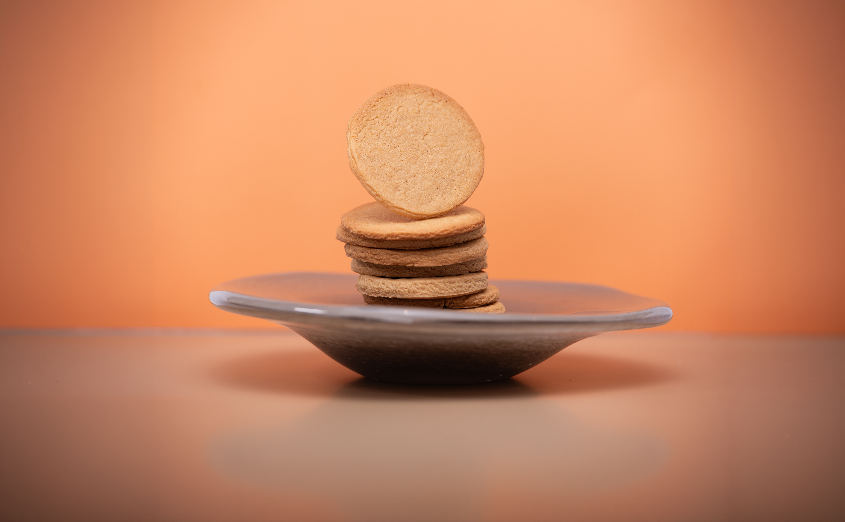 Stacked gingerbread cookies on a plate